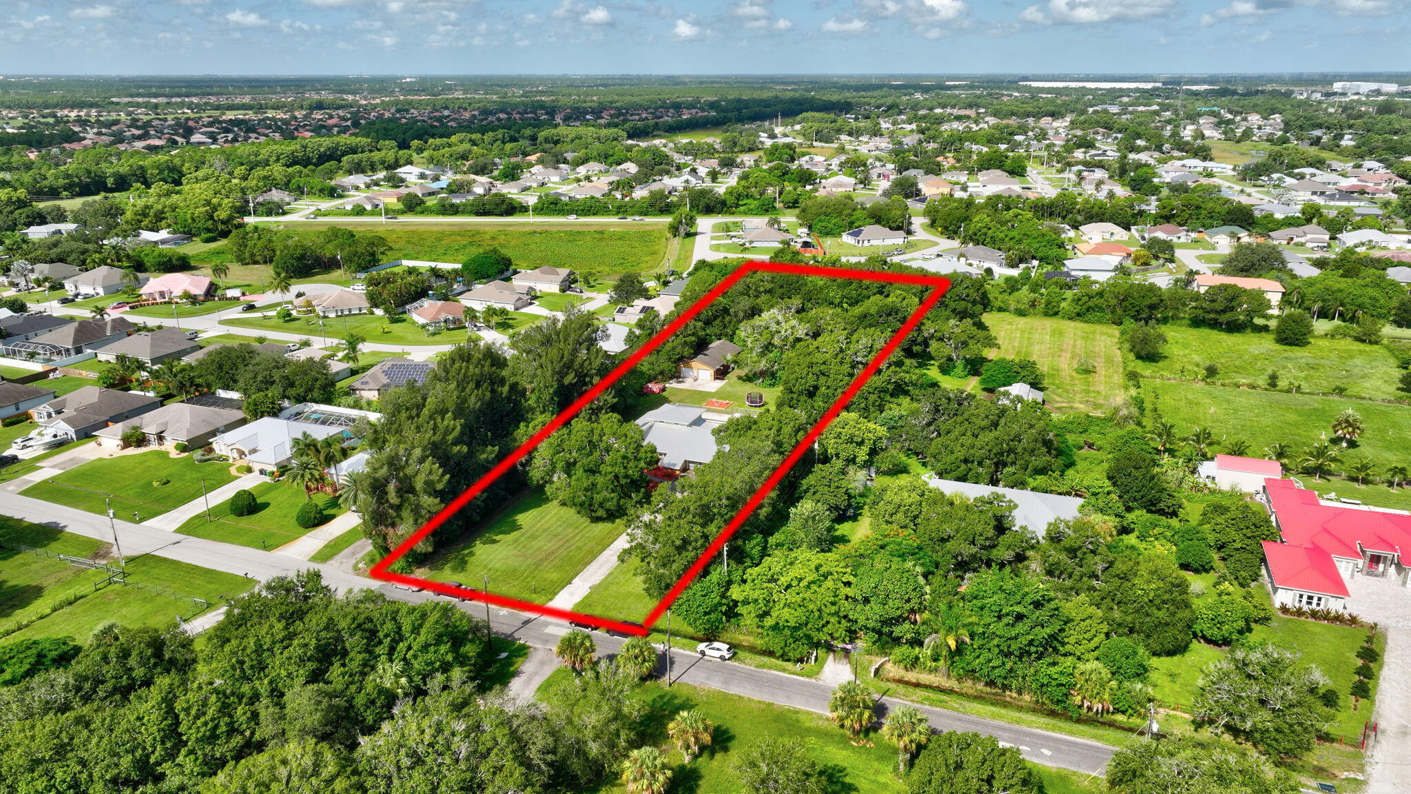 5191 Northwest Dunn Road Fort Pierce, FL 34981 - Photo 63 of 70 58-web-or-mls-DJI_20240823102442_0021_D_