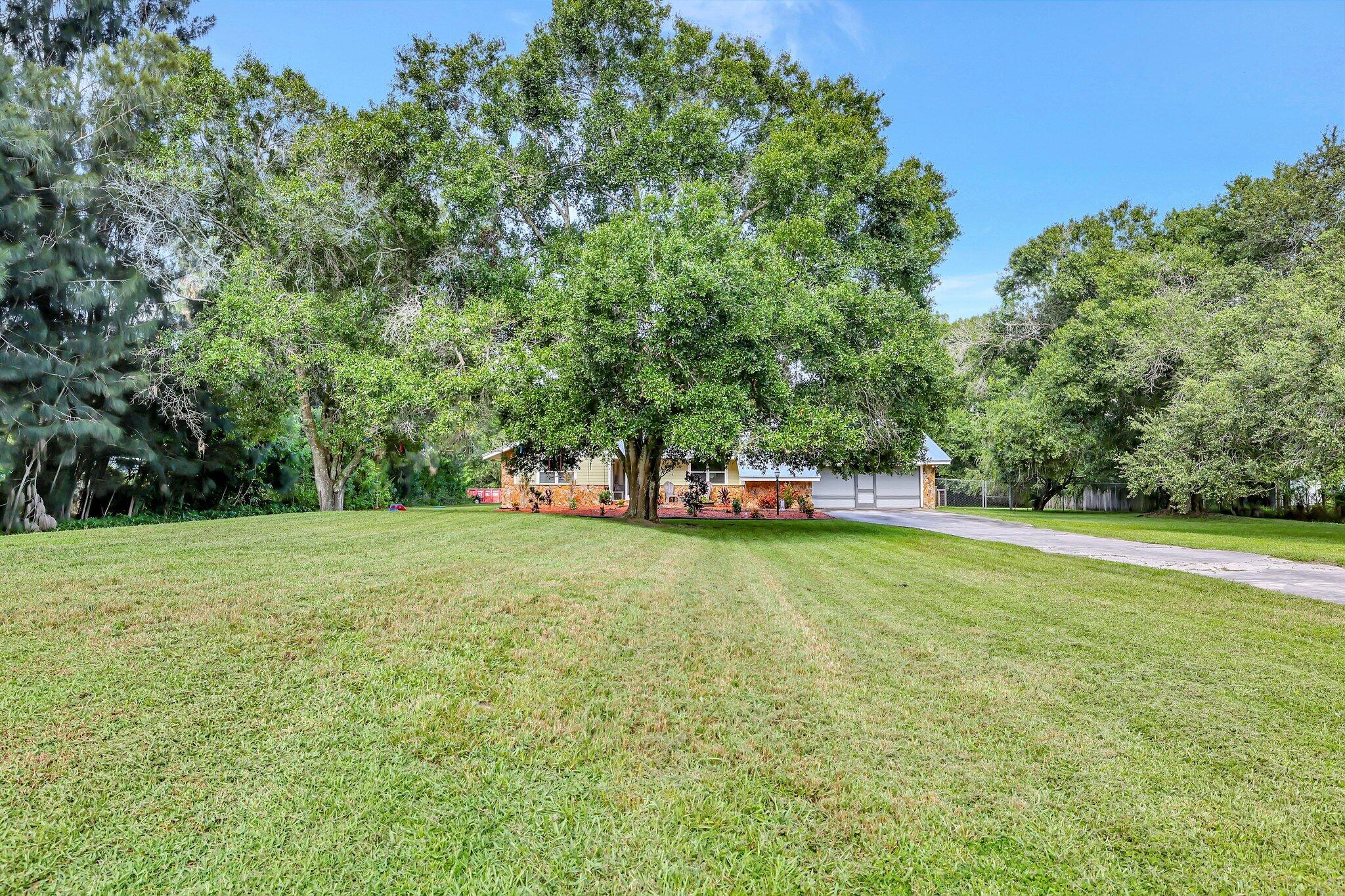 5191 Northwest Dunn Road Fort Pierce, FL 34981 - Photo 8 of 70 Large front yard!