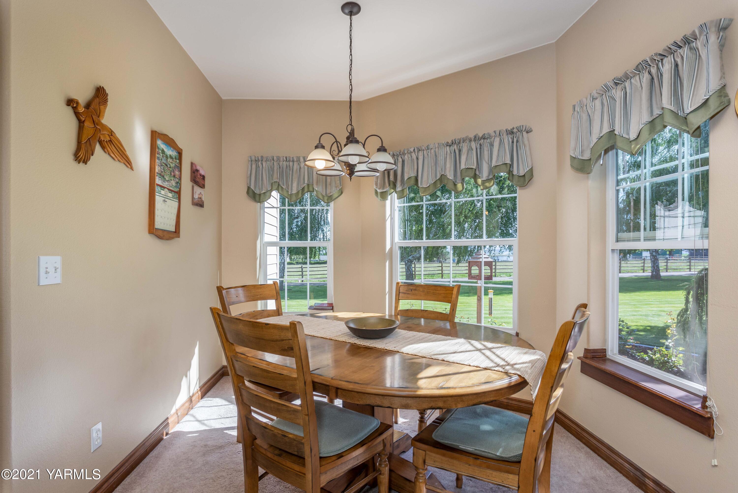 3131 Scoon Road Sunnyside, WA 98944 - Photo 7 of 33 a view of a dining room with furniture window and outside view