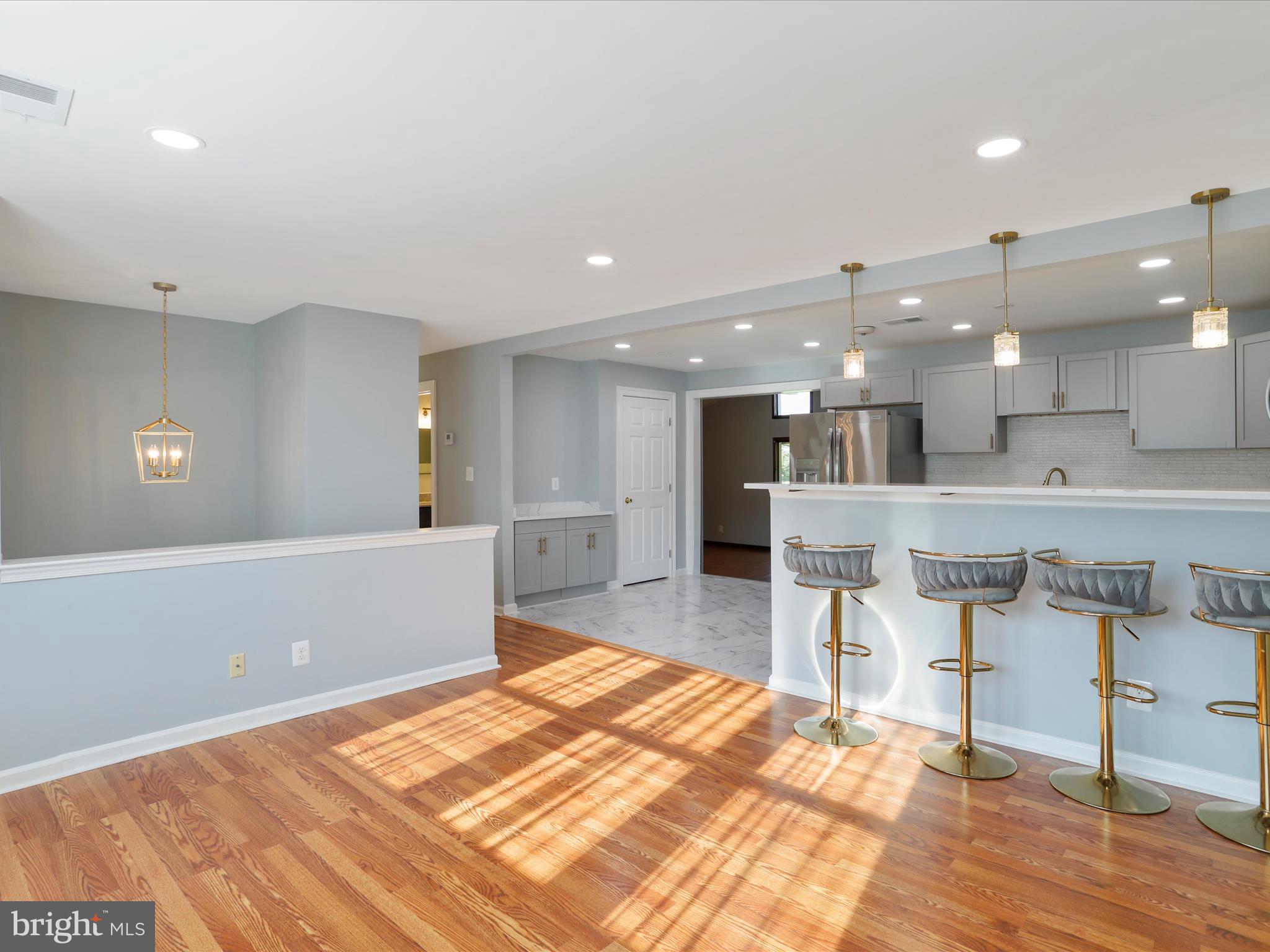 8175 Stone Bridge Road Greencastle, PA 17225 - Photo 11 of 44 a large white kitchen with lots of counter space and appliances