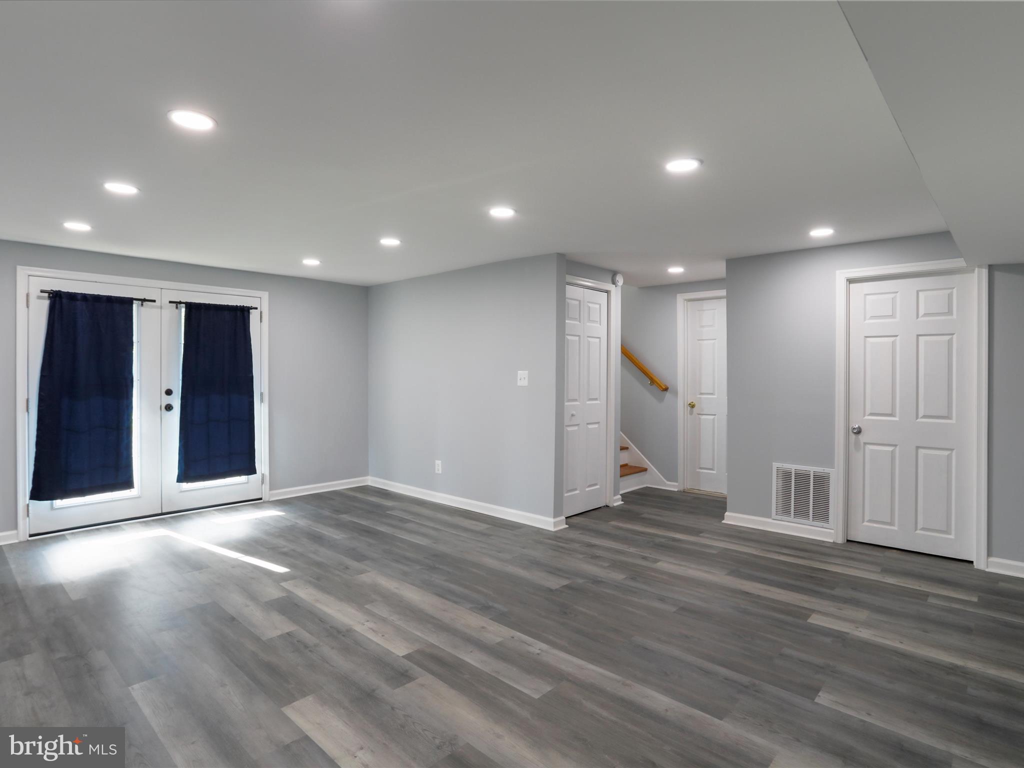 8175 Stone Bridge Road Greencastle, PA 17225 - Photo 31 of 44 a view of an empty room with wooden floor and closet area