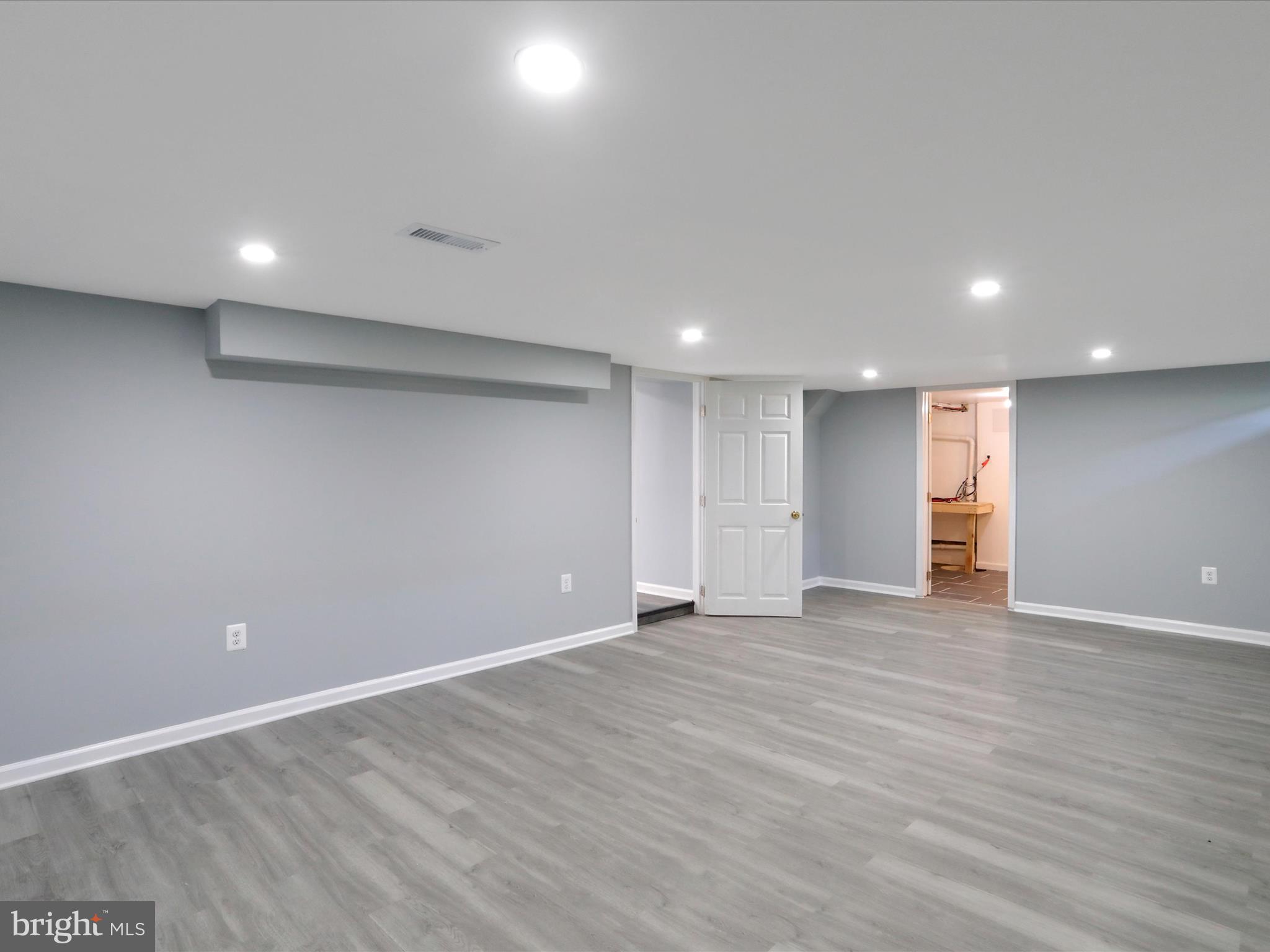 8175 Stone Bridge Road Greencastle, PA 17225 - Photo 34 of 44 a view of an empty room with wooden floor