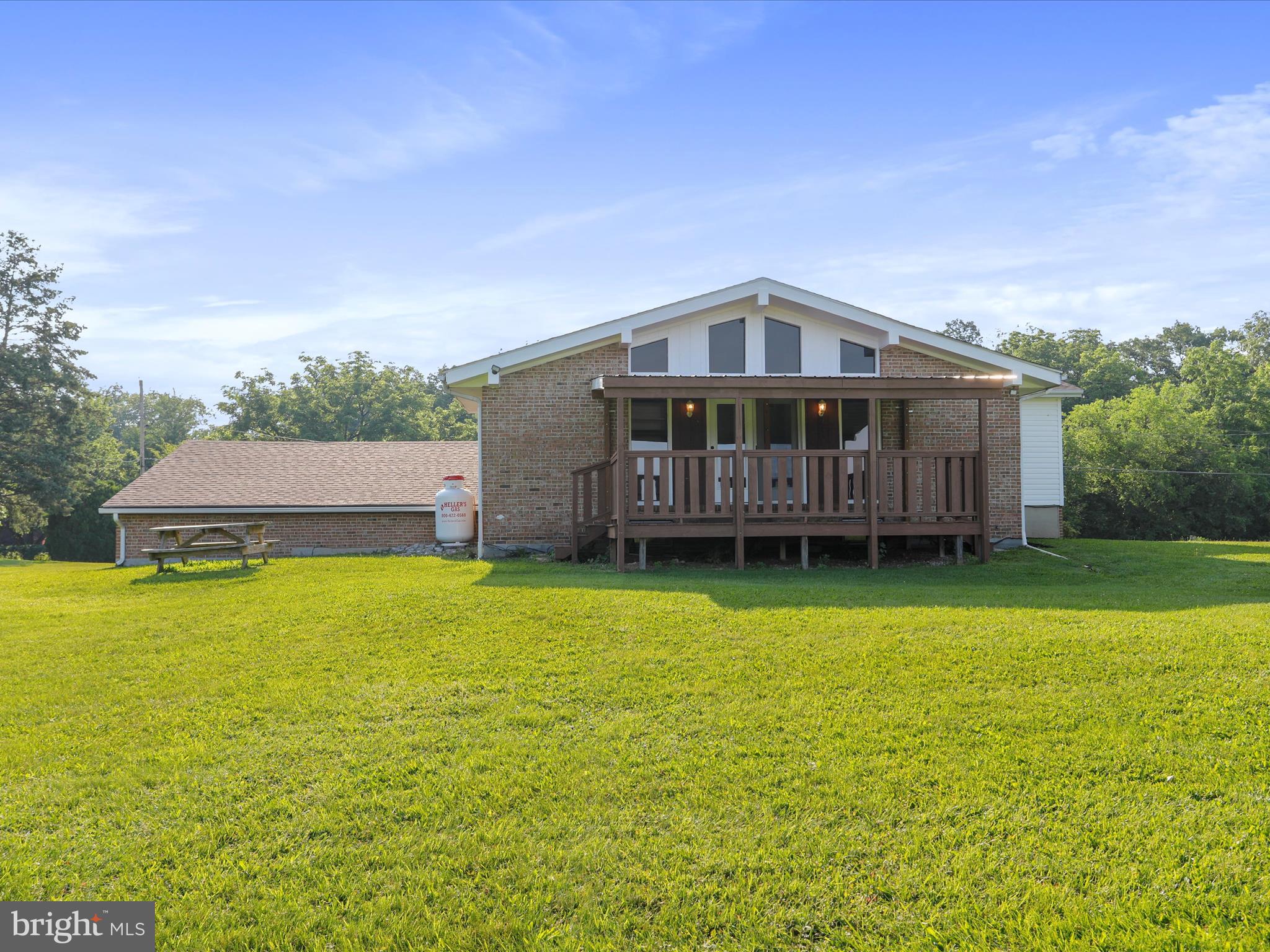 8175 Stone Bridge Road Greencastle, PA 17225 - Photo 40 of 44 a front view of house with ocean view and a big yard
