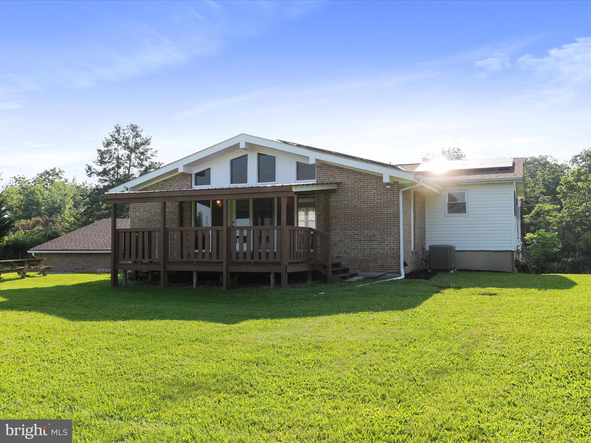 8175 Stone Bridge Road Greencastle, PA 17225 - Photo 41 of 44 a front view of house with yard and swimming pool