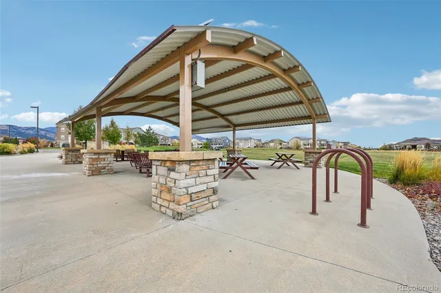 a view of a swimming pool with a patio