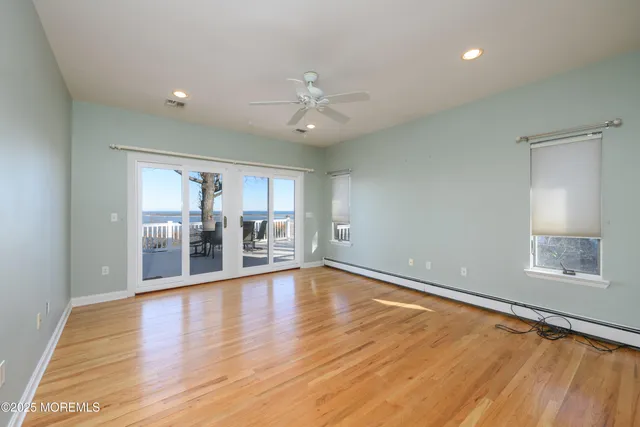 a kitchen with a sink dishwasher and white cabinets
