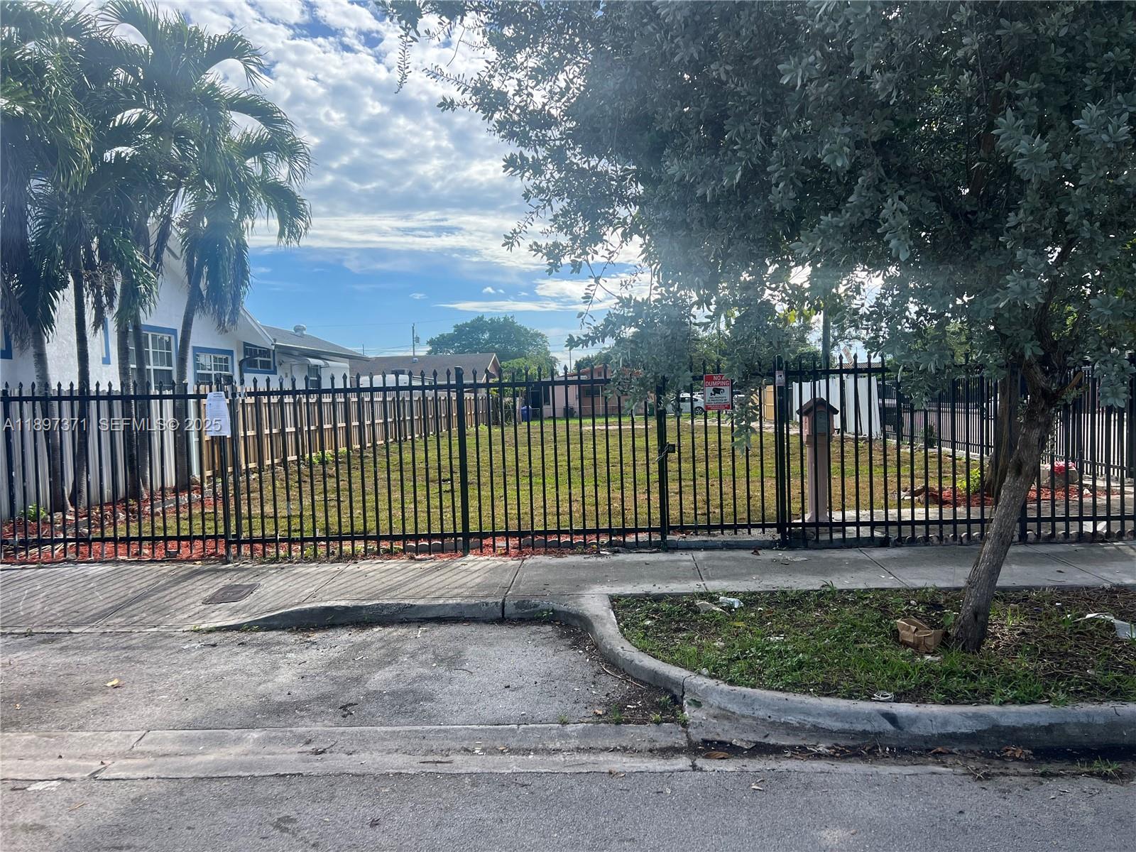 2052 Northwest 27th Street Miami, FL 33142 - Photo 5 of 14 a garden view