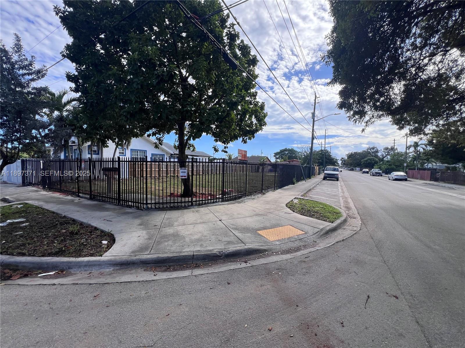 2052 Northwest 27th Street Miami, FL 33142 - Photo 10 of 14 a view of a backyard with basketball court