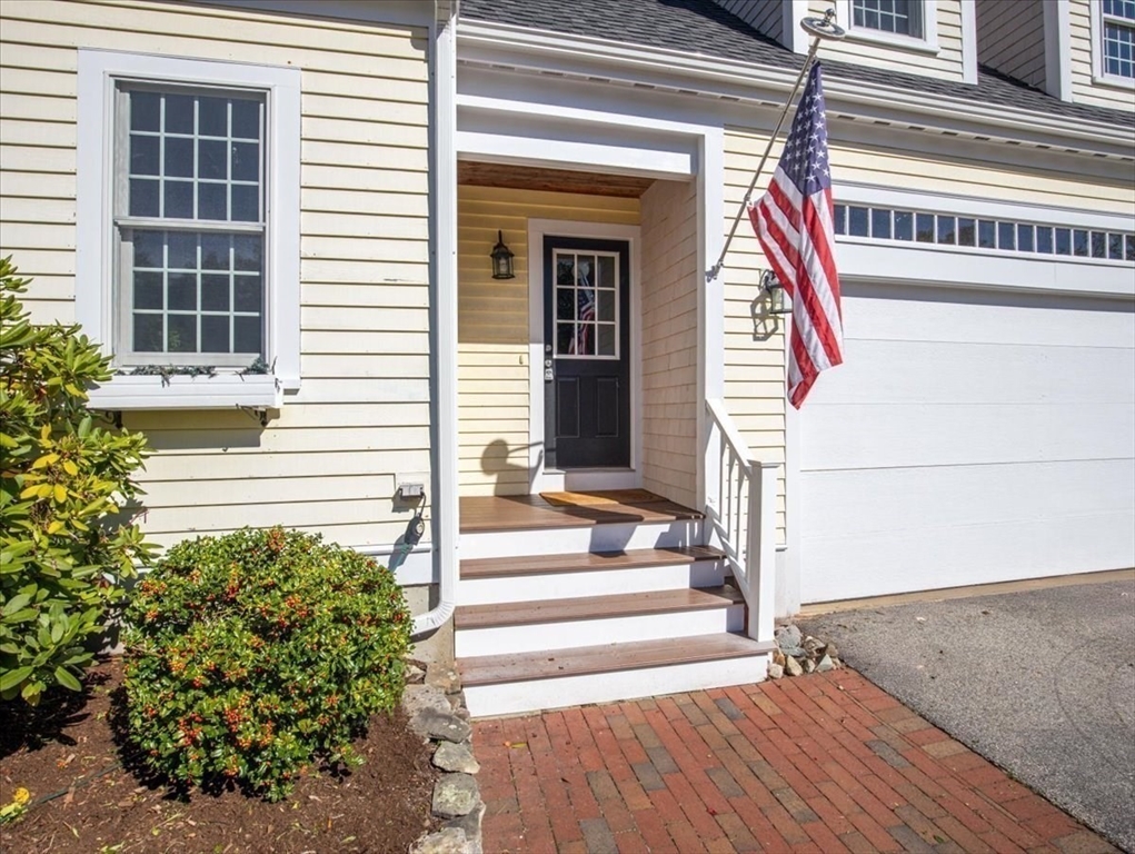 8 Trudys Lane Scituate, MA 02066 - Photo 17 of 41 a view of a house with a door and a porch