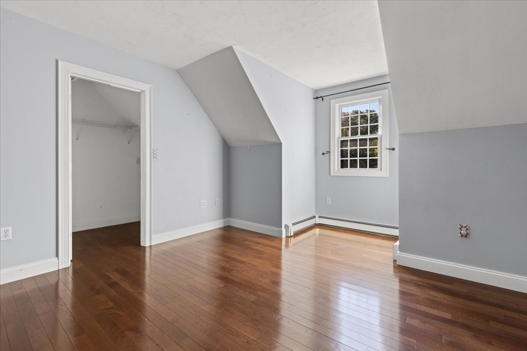 8 Trudys Lane Scituate, MA 02066 - Photo 29 of 41 a view of an empty room with wooden floor and a window