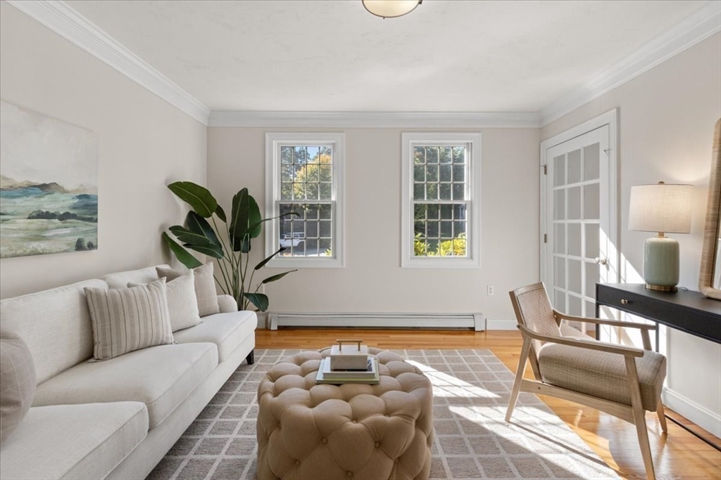8 Trudys Lane Scituate, MA 02066 - Photo 7 of 41 a living room with furniture and a potted plant