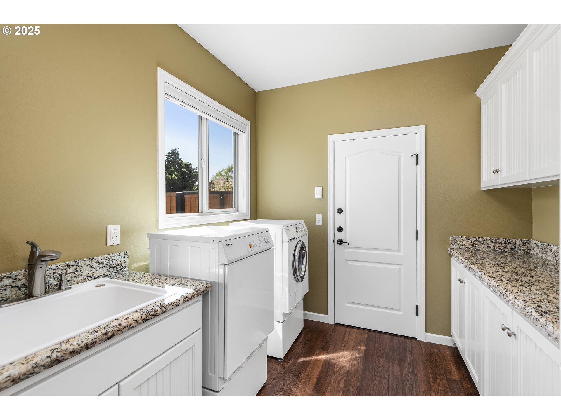 2053 Lakeview Drive Eugene, OR 97408 - Photo 15 of 45 a kitchen with a sink stove and cabinets