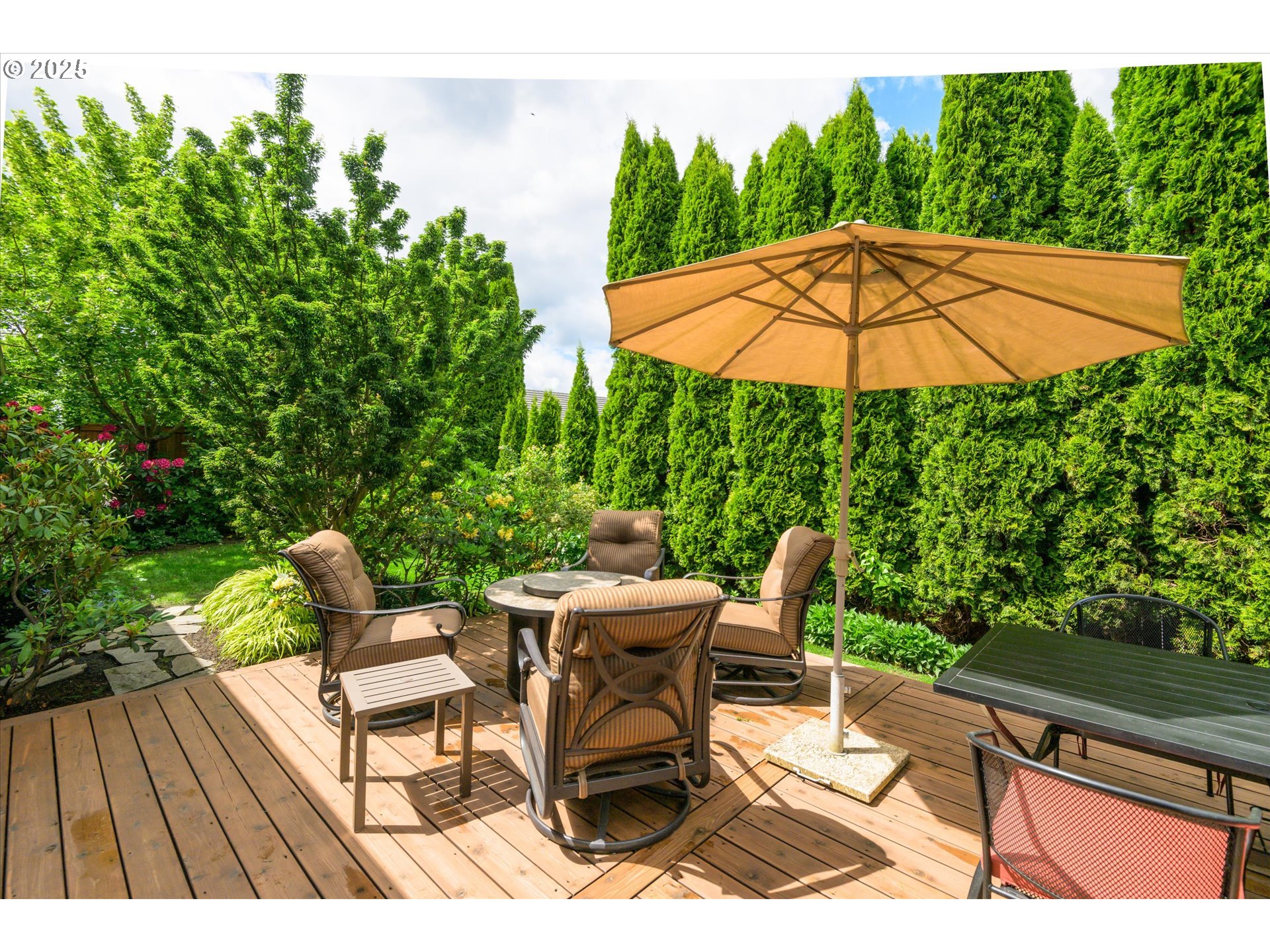 2053 Lakeview Drive Eugene, OR 97408 - Photo 38 of 45 a patio with a patio table and chairs