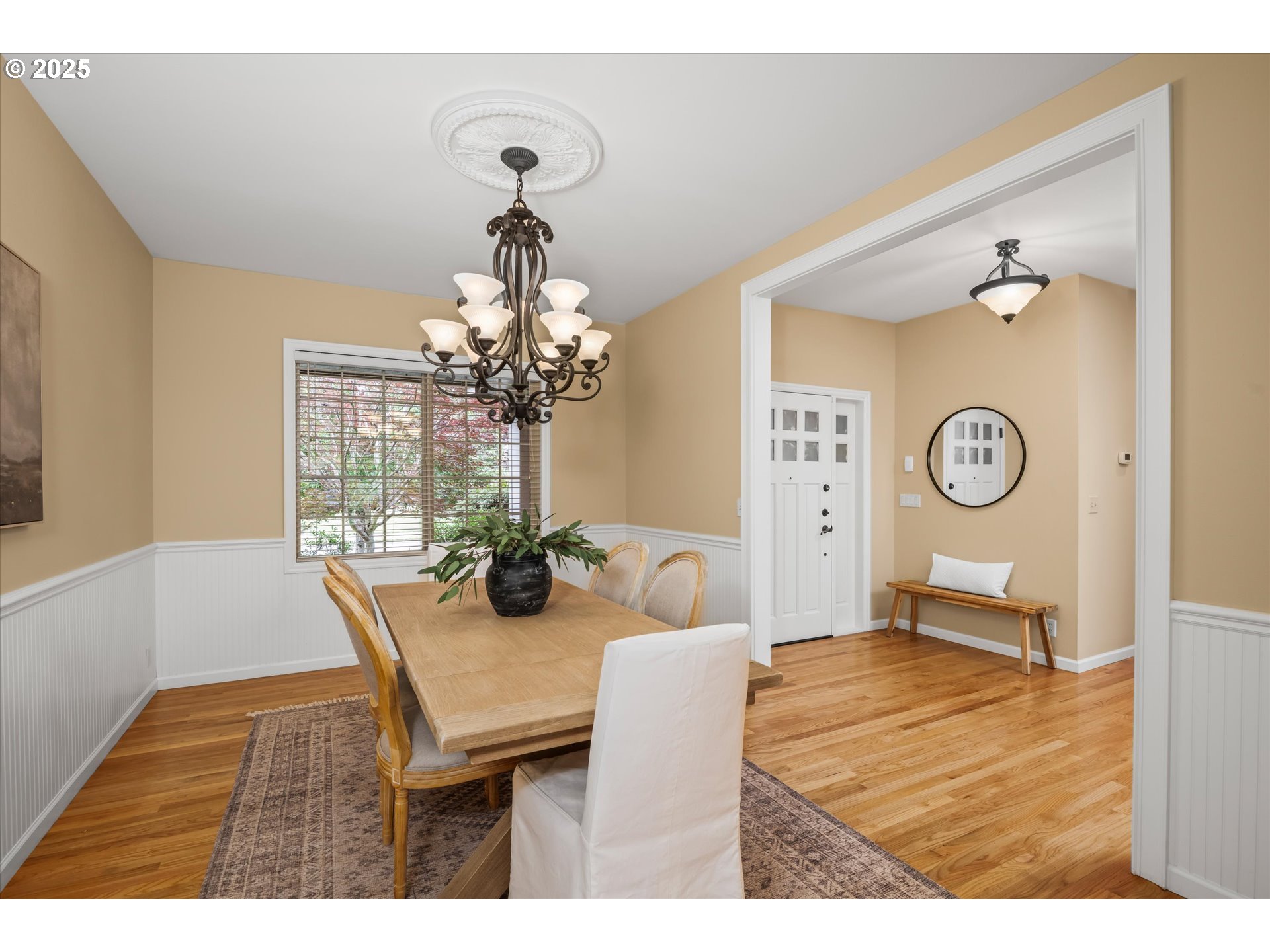 2053 Lakeview Drive Eugene, OR 97408 - Photo 6 of 45 a living room with dining table and a chandelier
