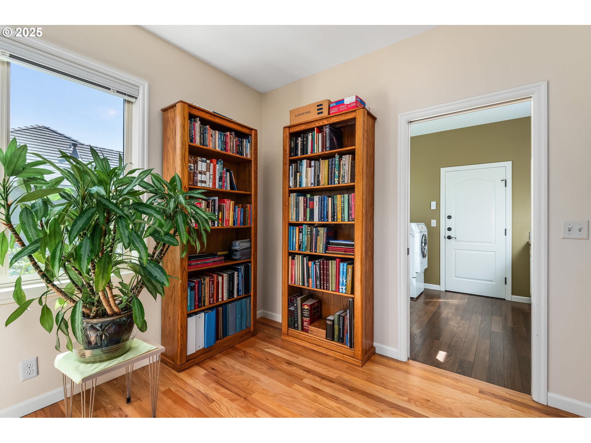 2053 Lakeview Drive Eugene, OR 97408 - Photo 7 of 45 a living room with a bookshelf and a book shelf
