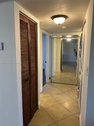 a view of a room with a bathroom