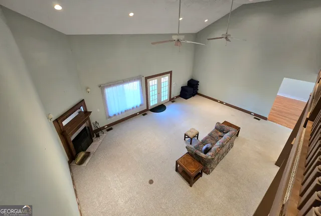 a very nice looking room with a large bed and a window