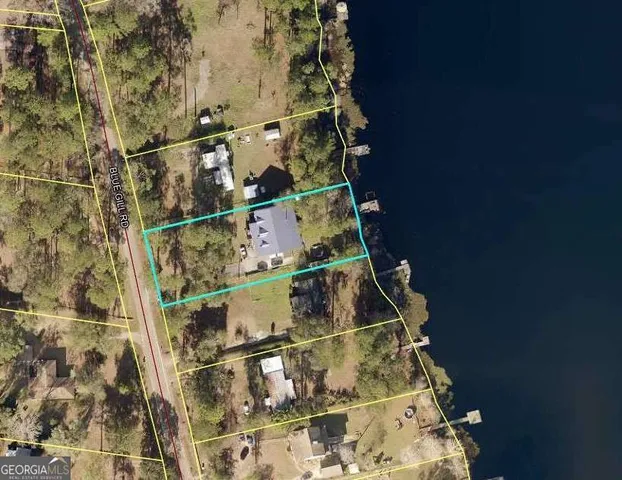 a view of a house with a big yard