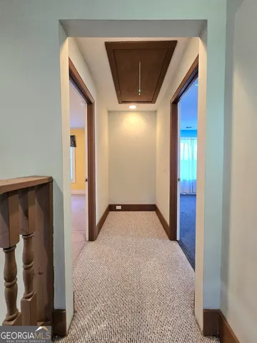 a view of a backyard of the house