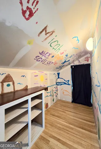 a view of front of house with a yard