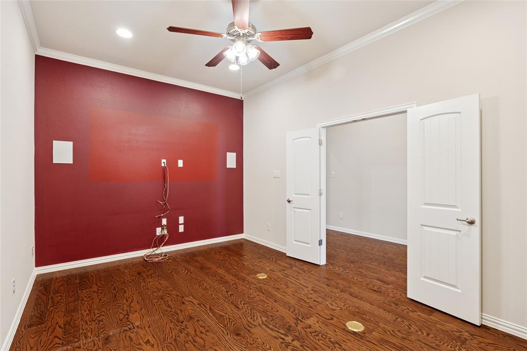 2104 Ladera Way, Unit 2104 Mansfield, TX 76063 - Photo 14 of 27 wooden floor in an empty room with a window