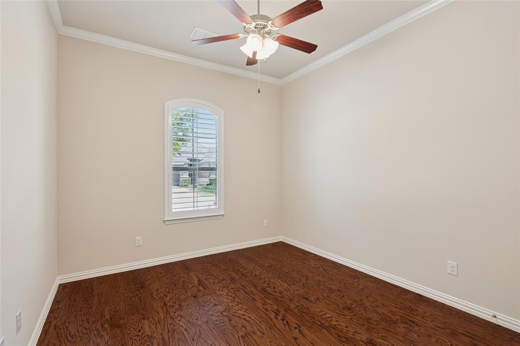 2104 Ladera Way, Unit 2104 Mansfield, TX 76063 - Photo 21 of 27 wooden floor in an empty room with a window