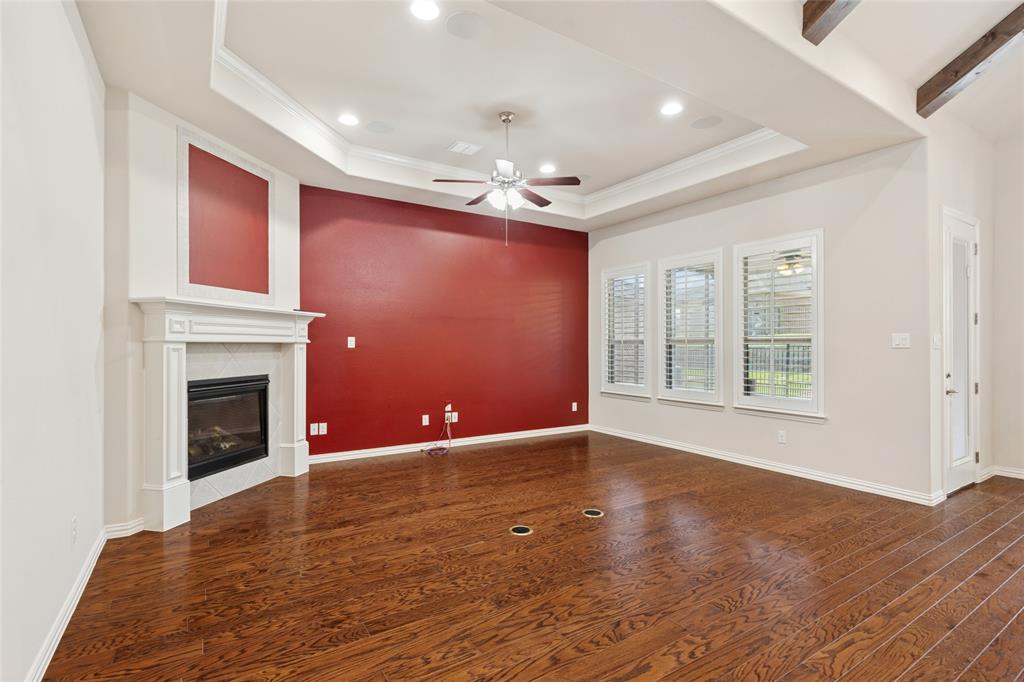 2104 Ladera Way, Unit 2104 Mansfield, TX 76063 - Photo 7 of 27 a view of an empty room with window and fire place