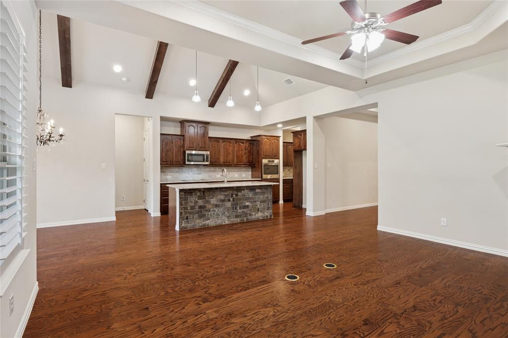 2104 Ladera Way, Unit 2104 Mansfield, TX 76063 - Photo 9 of 27 a view of a kitchen with a sink and refrigerator
