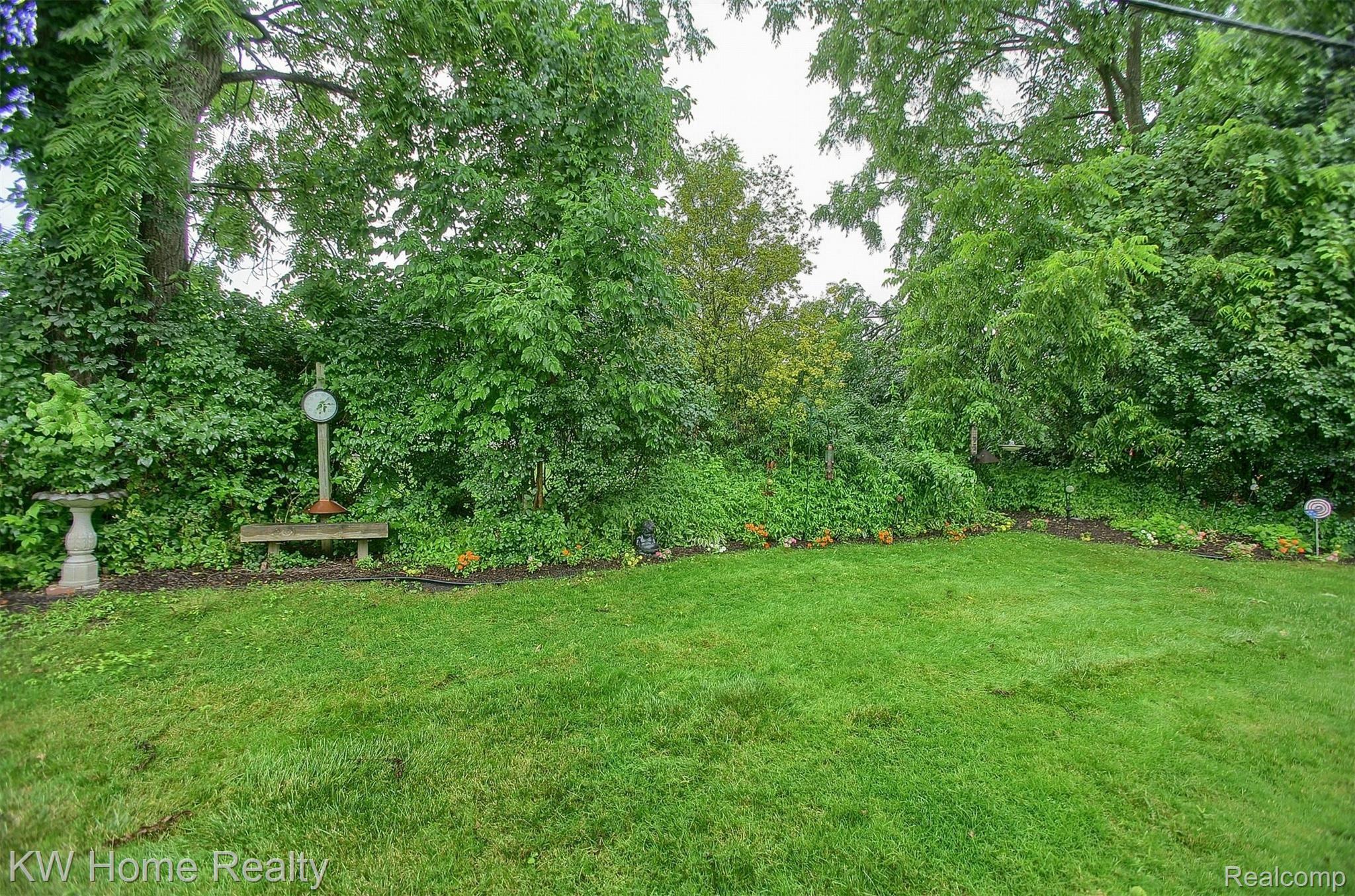 7074 Springridge Road West Bloomfield, MI 48322 - Photo 31 of 34 34-Backyard 2nd View.jpg