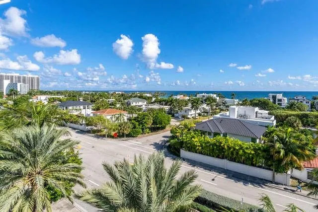a view of swimming pool with an outdoor seating