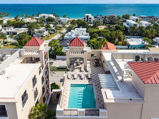 2401 North Ocean Boulevard, Unit 500 Fort Lauderdale, FL 33305 - Photo 27 of 38 an aerial view of multiple houses with yard