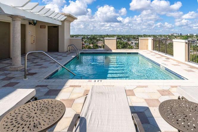2401 North Ocean Boulevard, Unit 500 Fort Lauderdale, FL 33305 - Photo 28 of 38 a view of swimming pool with an outdoor seating