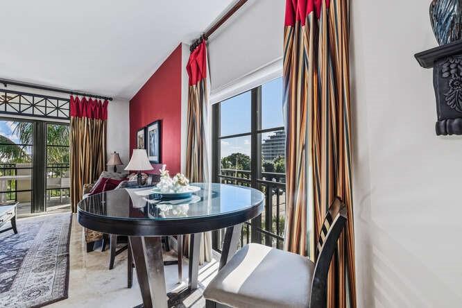 2401 North Ocean Boulevard, Unit 500 Fort Lauderdale, FL 33305 - Photo 9 of 38 a view of a dining room with furniture window and outside view