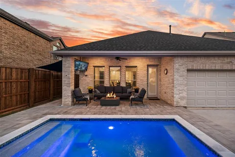 a backyard of a house with seating space