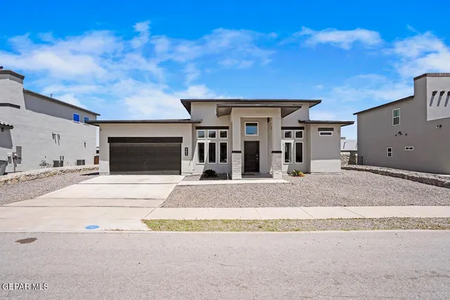 a view of a house with a patio