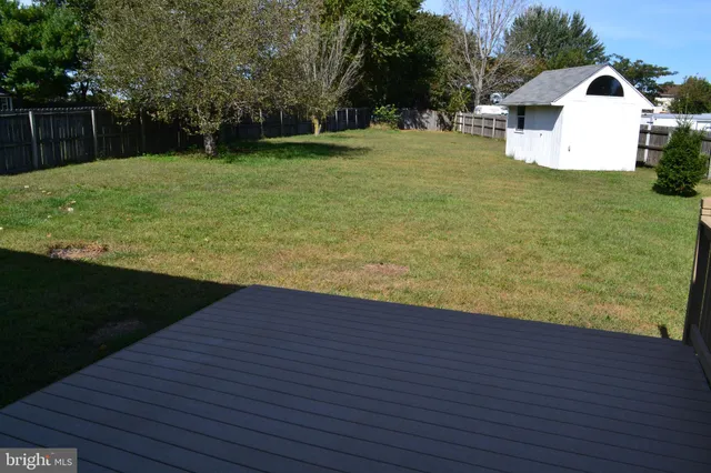 a view of a backyard with a garden