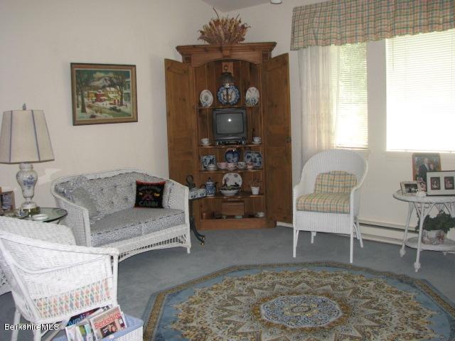 16 Hill Road Stockbridge, MA 01266 - Photo 11 of 20 a living room with furniture and wooden floor