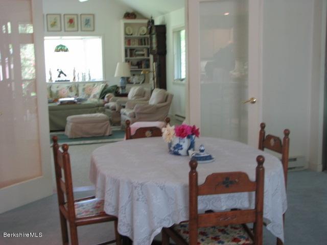 16 Hill Road Stockbridge, MA 01266 - Photo 13 of 20 a view of a dining room with furniture and a large window