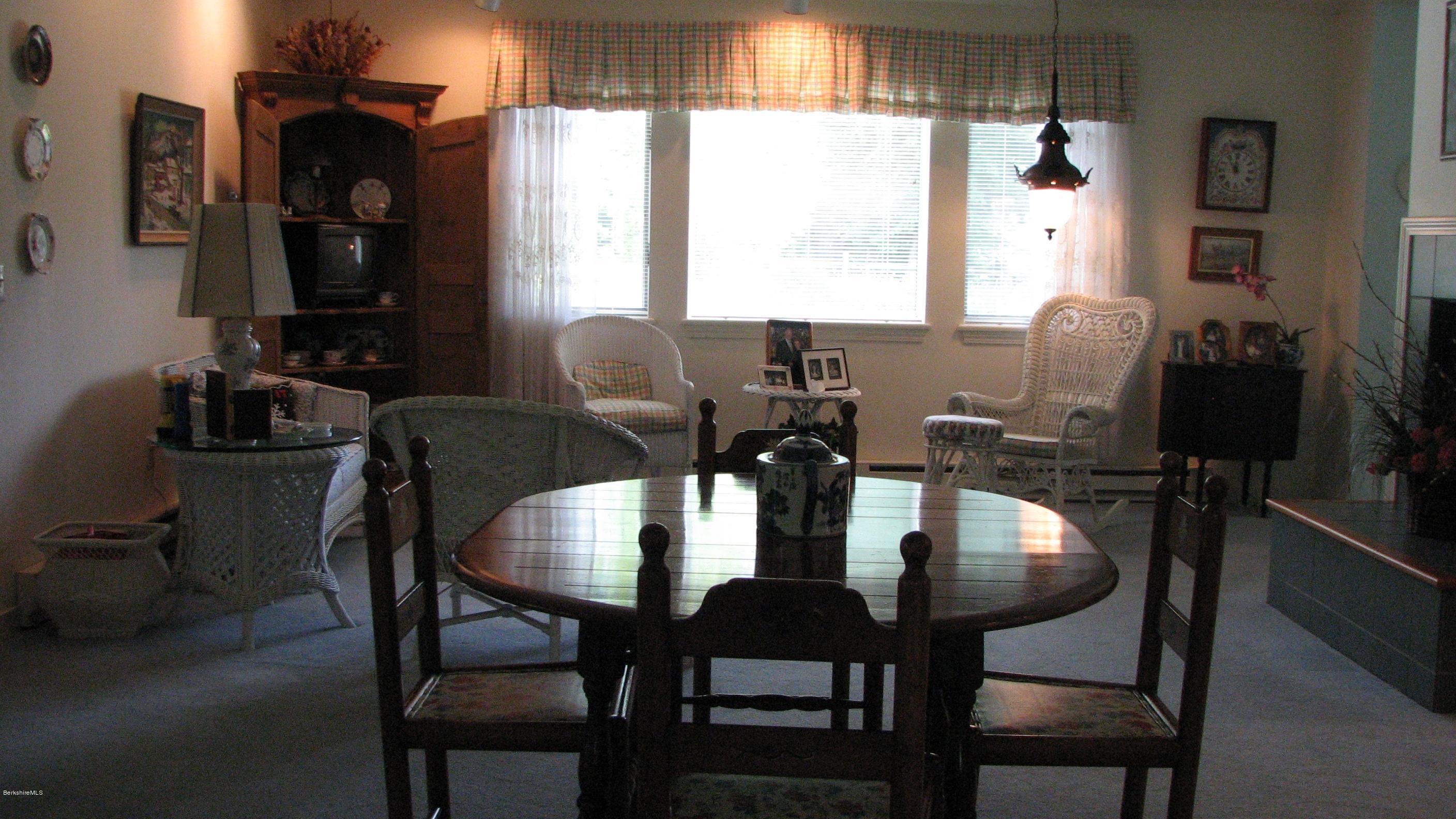 16 Hill Road Stockbridge, MA 01266 - Photo 14 of 20 a view of a dining room with furniture and window