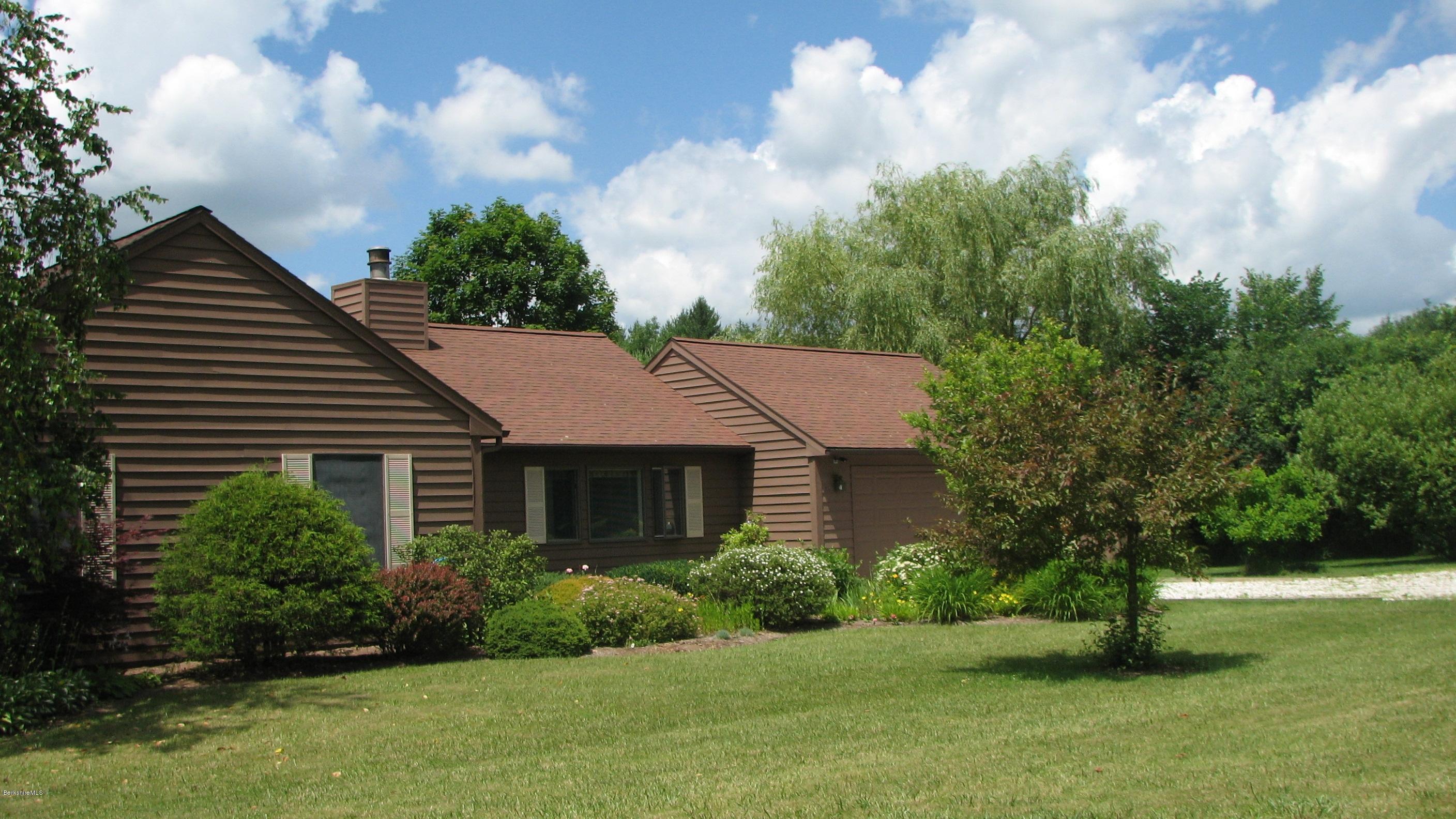 16 Hill Road Stockbridge, MA 01266 - Photo 19 of 20 a front view of a house with garden
