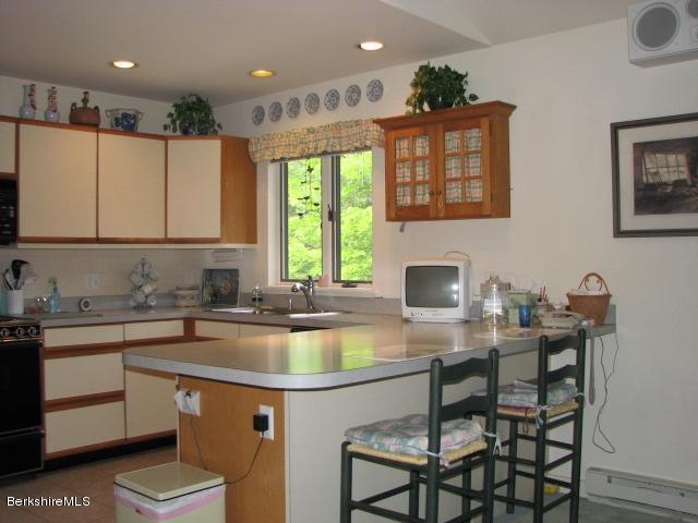 16 Hill Road Stockbridge, MA 01266 - Photo 5 of 20 a kitchen with a sink cabinets and window