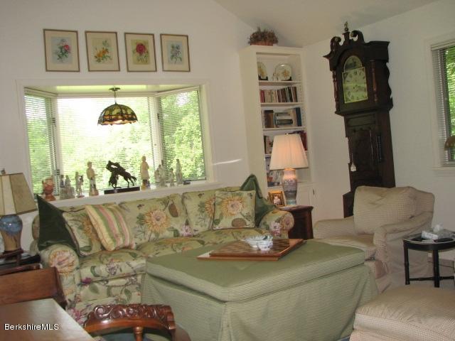 16 Hill Road Stockbridge, MA 01266 - Photo 9 of 20 a living room with furniture and painting on the wall