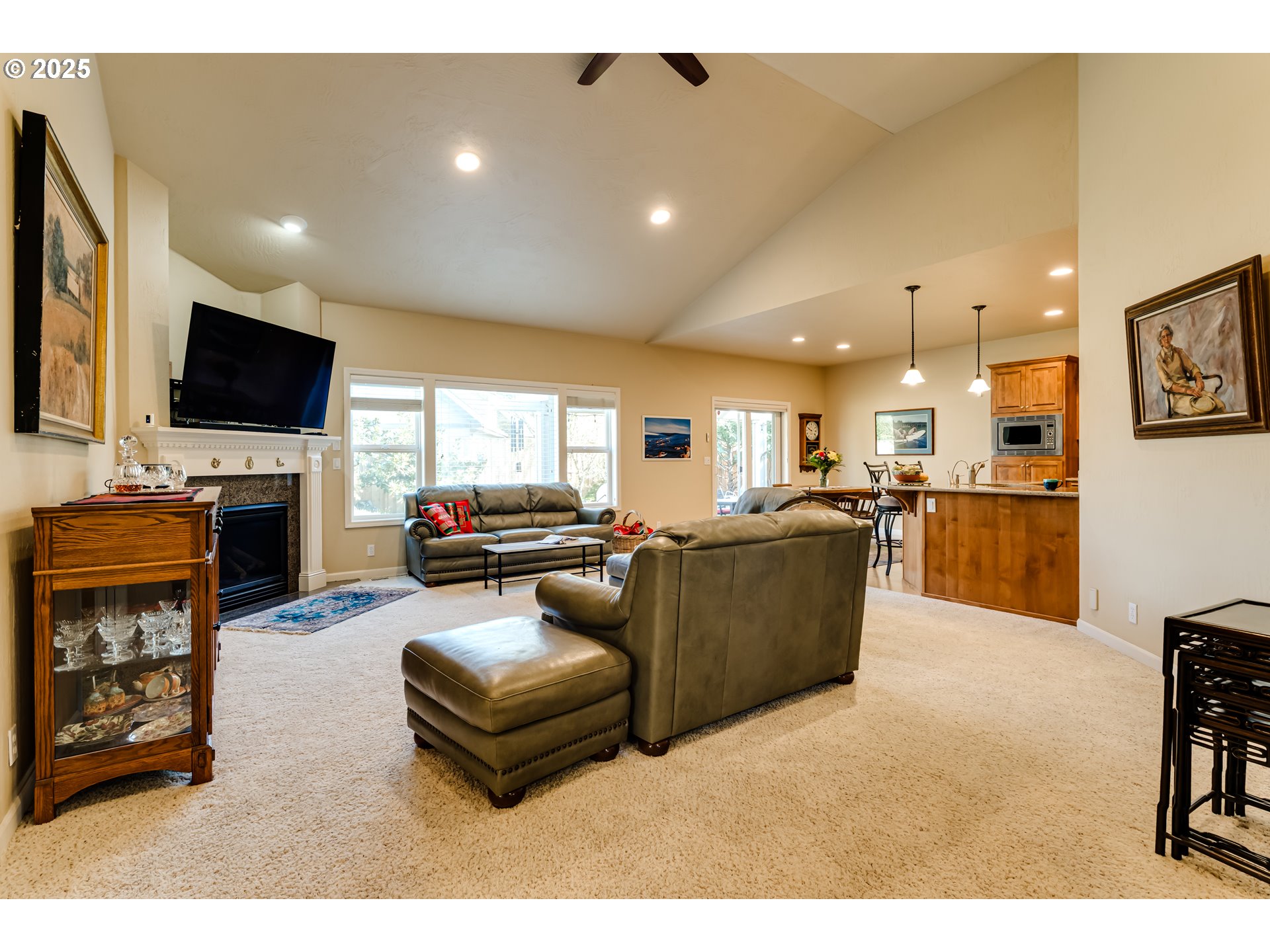 3351 Cape Hatteras Drive Eugene, OR 97408 - Photo 25 of 47 a living room with furniture and a flat screen tv