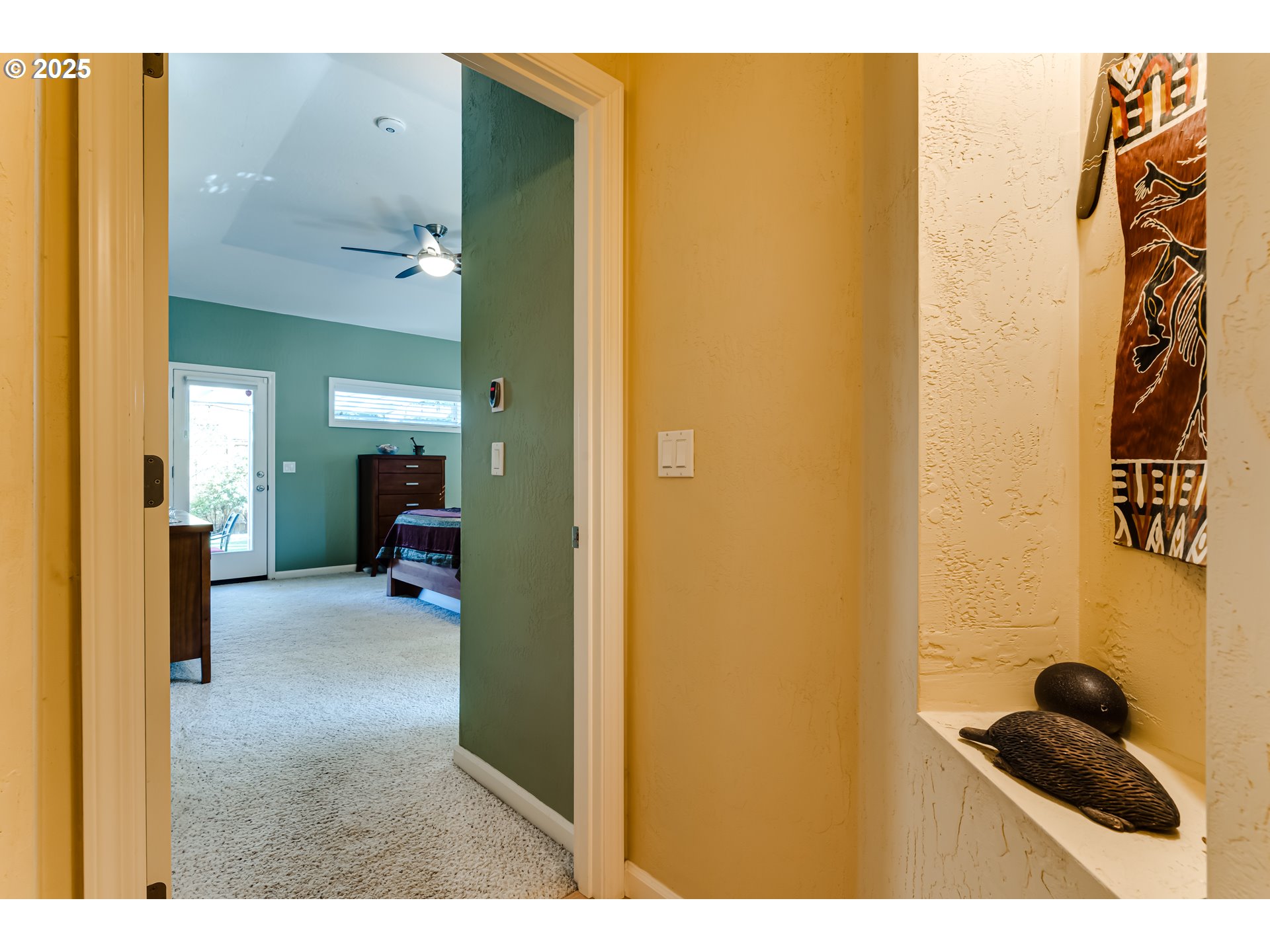3351 Cape Hatteras Drive Eugene, OR 97408 - Photo 26 of 47 a view of a room that has a bed and a chair in it