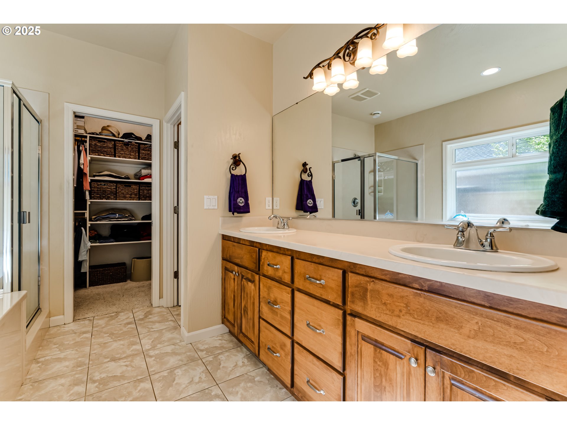 3351 Cape Hatteras Drive Eugene, OR 97408 - Photo 31 of 47 a bathroom with a sink a vanity and a mirror