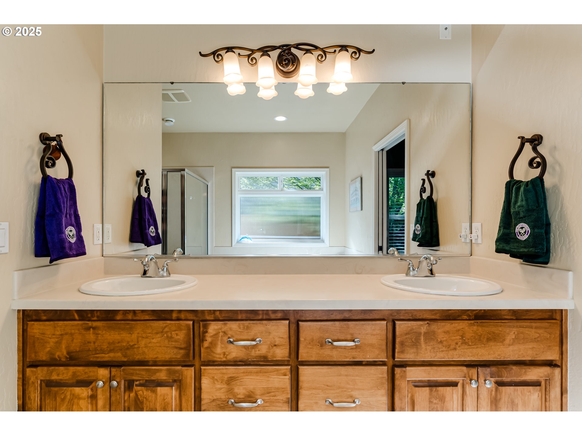 3351 Cape Hatteras Drive Eugene, OR 97408 - Photo 32 of 47 a bathroom with a sink vanity and mirror