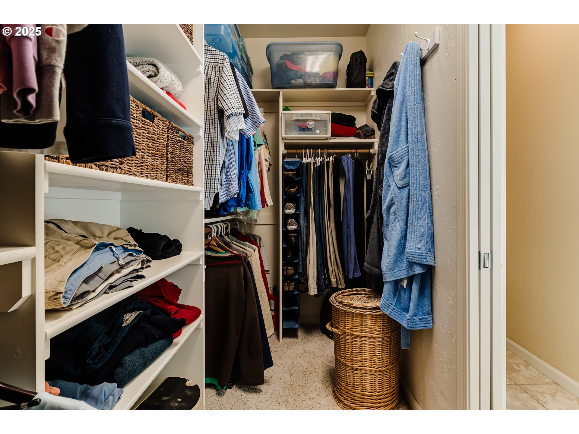 3351 Cape Hatteras Drive Eugene, OR 97408 - Photo 33 of 47 a view of walk in closet with clothes and shoes