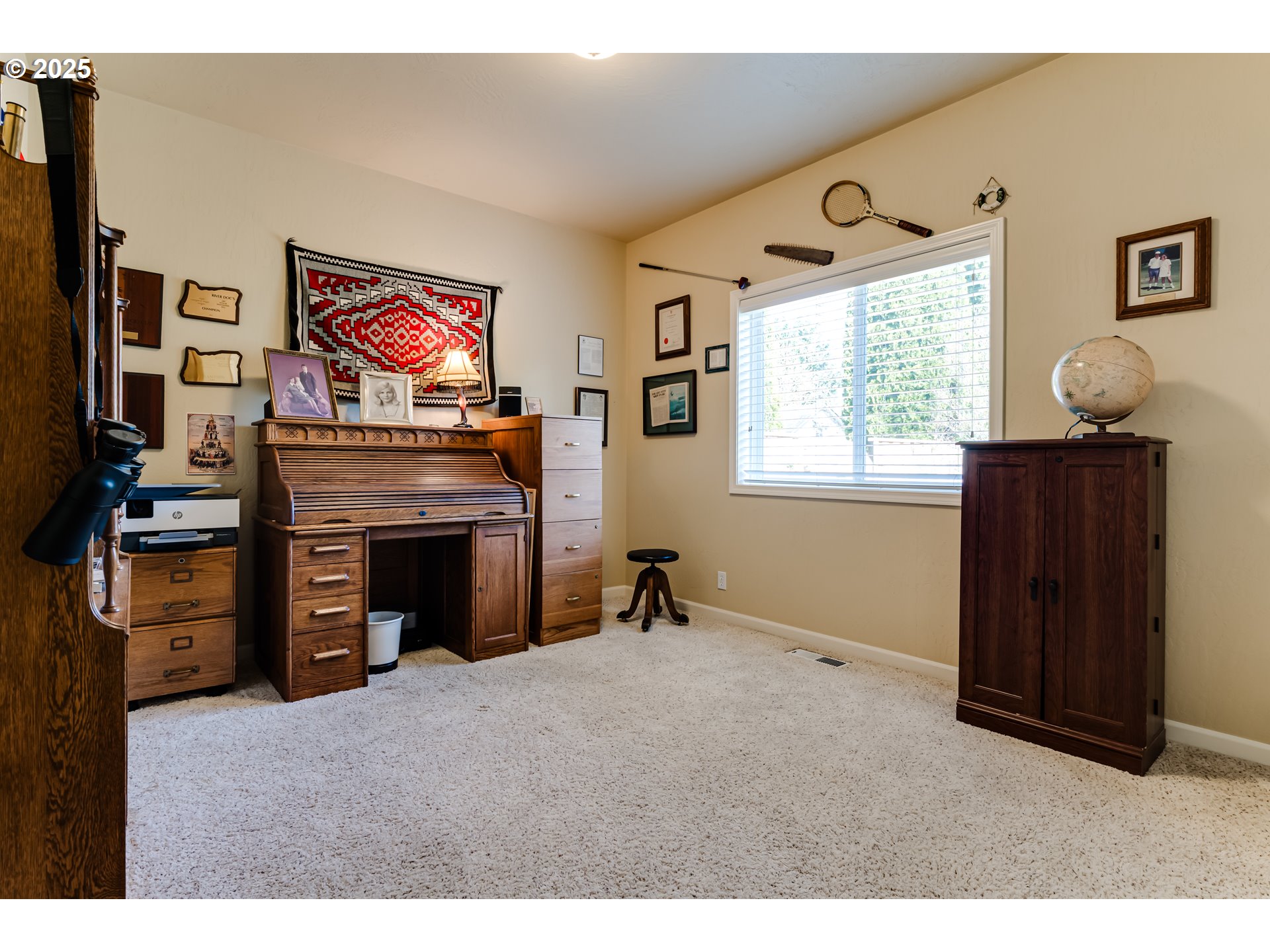 3351 Cape Hatteras Drive Eugene, OR 97408 - Photo 39 of 47 a living room with furniture and a fireplace