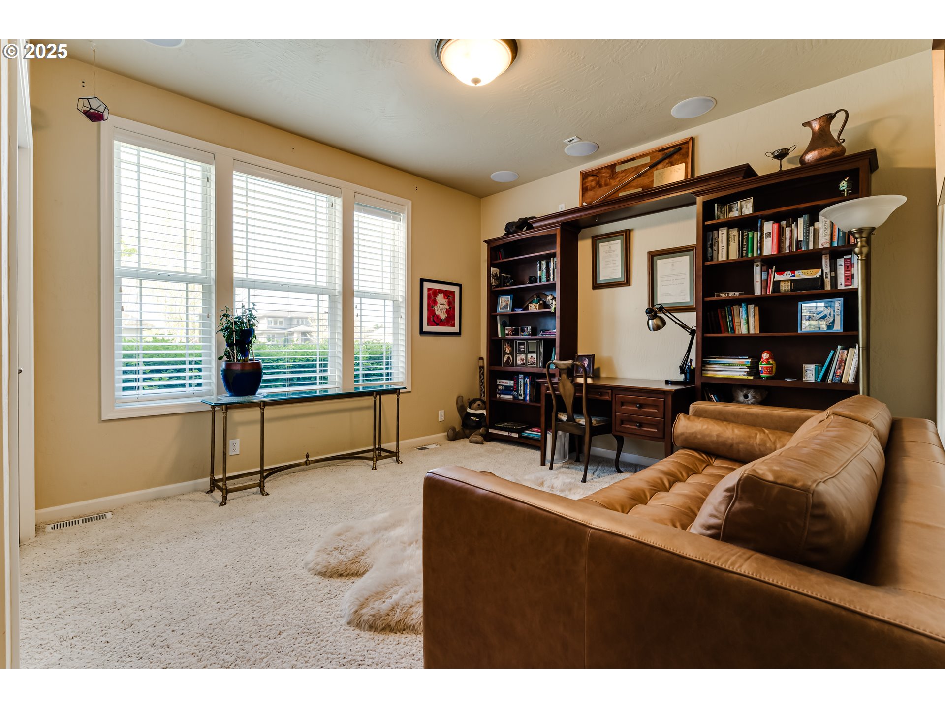 3351 Cape Hatteras Drive Eugene, OR 97408 - Photo 44 of 47 a living room with furniture a rug and a large window