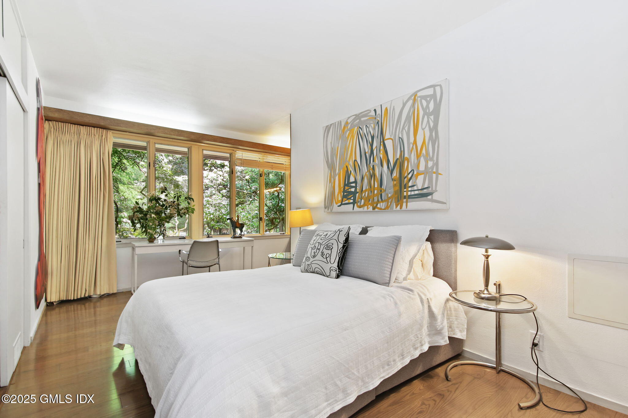 21 Hycliff Road Greenwich, CT 06831 - Photo 15 of 25 a bedroom with a bed and with a window